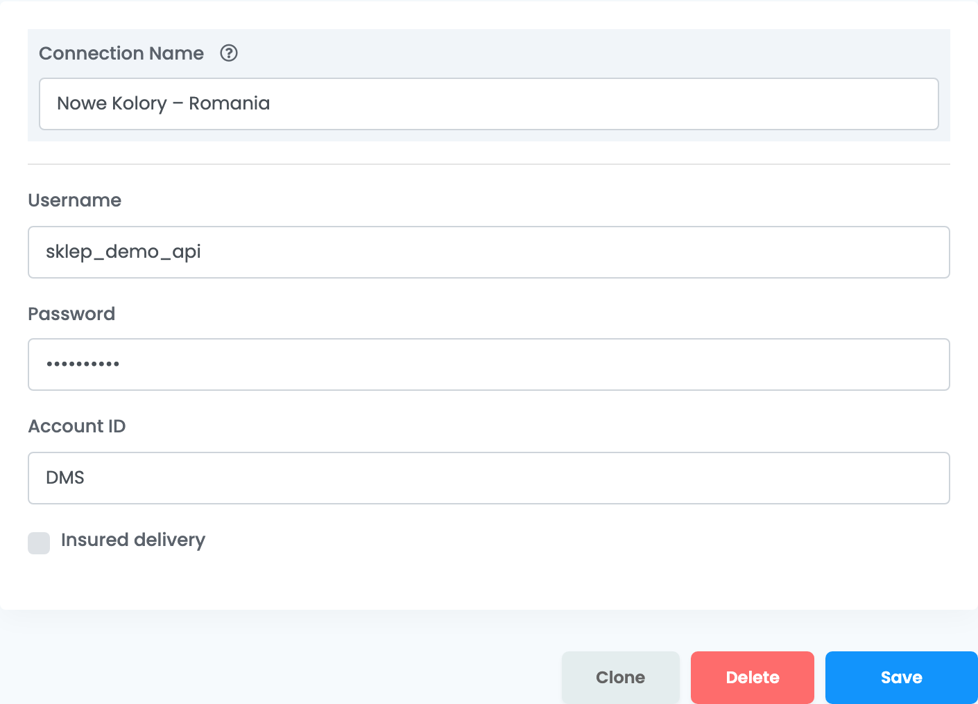 Das Verbindungsformular von Nowe Kolory in der englischen Oberfläche: Connection Name Nowe Kolory – Romania, Username sklep_demo_api, ein maskiertes Password, Account ID DMS, das nicht aktivierte Kontrollkästchen Insured delivery sowie die Schaltflächen Clone, Delete und Save.